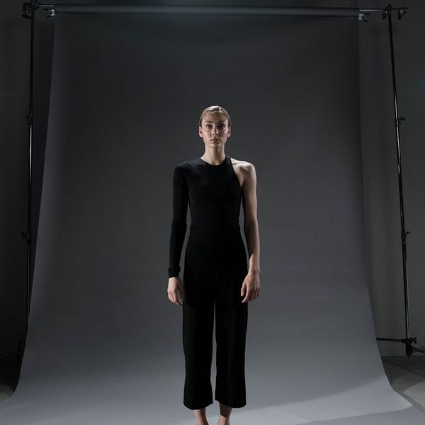 Person finding balance in a standing yoga posture.